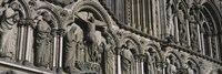 Low angle view of statues carved on wall of a cathedral, Trondheim, Norway Fine Art Print