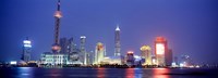 Buildings lit up at dusk, Shanghai, China Fine Art Print