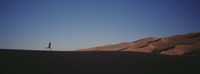 USA, Colorado, Great Sand Dunes National Monument, Runner jogging in the park Fine Art Print