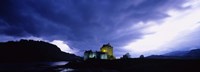 Low Angle View Of A Castle Lit Up At Dusk, Eilean Donan Castle, Highlands, Scotland, United Kingdom Fine Art Print