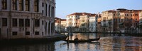 Man on a gondola in a canal, Grand Canal, Venice, Italy Fine Art Print
