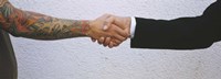 Close-Up Of Two Men Shaking Hands, Germany Fine Art Print