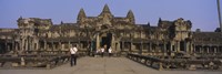 Tourists walking in front of an old temple, Angkor Wat, Siem Reap, Cambodia Fine Art Print