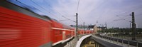 Red Train on railroad tracks, Central Station, Berlin, Germany Fine Art Print