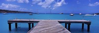 Pier with boats in the background, Sandy Ground, Anguilla Fine Art Print