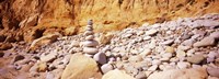 Stack of stones on the beach, California, USA Fine Art Print