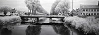 Bridge across a channel connecting Bruges to Damme, West Flanders, Belgium Fine Art Print