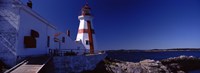 Lighthouse on the coast, Head Harbour Light, Campobello Island, New Brunswick, Canada Fine Art Print
