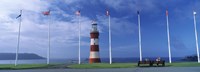 Lighthouse with flags on the coast, Smeaton's Tower, Plymouth Hoe, Plymouth, Devon, England by Panoramic Images - 36" x 12"