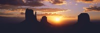 Silhouette of buttes at sunset, The Mittens, Monument Valley Tribal Park, Monument Valley, Utah, USA Fine Art Print