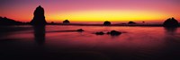 Sunset over rocks in the ocean, Big Sur, California, USA Fine Art Print
