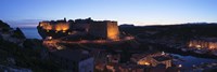 Castle lit up at night, Bonifacio Harbour, Corsica, France Fine Art Print
