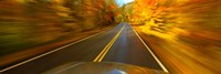 Road viewed through the windshield of a moving car Fine Art Print