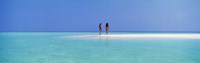 Two women standing on the beach sandbar, Maayafushi Island, Ari Atoll, Maldives Fine Art Print