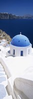 High angle view of a church with blue dome, Oia, Santorini, Cyclades Islands, Greece Fine Art Print