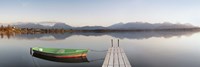 Rowboat moored at a jetty on Lake Hopfensee, Ostallgau, Bavaria, Germany by Panoramic Images - various sizes