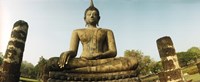 Low angle view of a statue of Buddha, Sukhothai Historical Park, Sukhothai, Thailand Fine Art Print