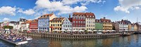 Tourists in a tourboat with buildings along a canal, Nyhavn, Copenhagen, Denmark Fine Art Print