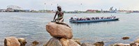 Little Mermaid Statue with tourboat in a canal, Copenhagen, Denmark Fine Art Print