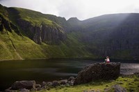 Young Woman Meditating, Coumshingaun Lough, Coeragh Mountains, County Waterford, Ireland Fine Art Print