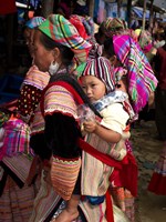 Flower Hmong woman carrying baby on her back, Bac Ha Sunday Market, Lao Cai Province, Vietnam by Panoramic Images - 27" x 36"