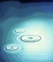 Three rings in deep blue water with circle of light Fine Art Print