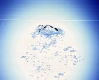 Churning bubbles rising upwards with bright light background by Panoramic Images - 24" x 20"