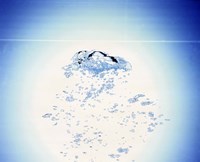 Churning bubbles rising upwards with bright light background Fine Art Print