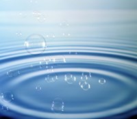 Large rings in blue water with bubbles Fine Art Print