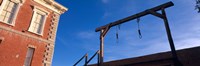 Low angle view of gallows, Tombstone Courthouse State Historic Park, Tombstone, Arizona, USA Fine Art Print