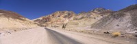 Road passing through mountains, Artist's Drive, Death Valley National Park, California, USA by Panoramic Images - 28" x 9"
