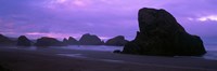 Silhouette of rock formations in the sea against a pink sky, Myers Creek Beach, Oregon Fine Art Print