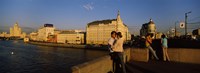 Side profile of a couple romancing, Moskva River, Moscow, Russia Fine Art Print