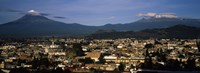 Aerial view of a city a with mountain range in the background, Popocatepetl Volcano, Cholula, Puebla State, Mexico by Panoramic Images - 25" x 9"