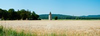Wheatfield with stone tower, Meyrargues, Bouches-Du-Rhone, Provence-Alpes-Cote d'Azur, France Fine Art Print