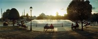 People sitting at a fountain with Blue Mosque in the background, Istanbul, Turkey Fine Art Print