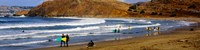 Surfers on the beach, California, USA Fine Art Print