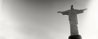 Low angle view of Christ The Redeemer, Corcovado, Rio de Janeiro, Brazil (black and white) by Panoramic Images - 22" x 9"
