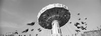 Low angle view of people spinning on a carousel, Stuttgart, Baden-Wurttemberg, Germany Fine Art Print