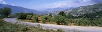Road passing through a landscape with mountains in the background, Andalucian Sierra Nevada, Andalusia, Spain Fine Art Print
