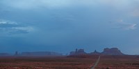 Buttes Rock Formations Under a Stormy Sky Fine Art Print