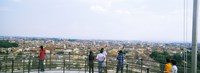 Tourists looking at city from Leaning Tower Of Pisa, Piazza Dei Miracoli, Pisa, Tuscany, Italy Fine Art Print