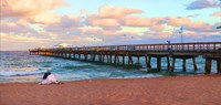 Couple sitting on the beach at sunset, Fort Lauderdale, Florida, USA Fine Art Print