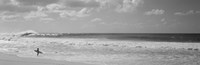 Surfer standing on the beach in black and white, Oahu, Hawaii by Panoramic Images - 37" x 12", FulcrumGallery.com brand