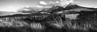 Fence with mountains in the background, Colorado (black and white) Fine Art Print