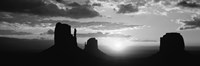 Silhouette of buttes at sunset, Monument Valley, Utah (black and white) by Panoramic Images - 36" x 12"