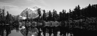 Reflection of trees and mountains in a lake, Mount Shuksan, North Cascades National Park, Washington State (black and white) Framed Print