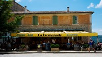 Tourists at a restaurant, Avenue de la Promenade, Sault, Vaucluse, Provence-Alpes-Cote d'Azur, France Fine Art Print
