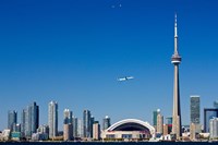 Airplane over city skylines, CN Tower, Toronto, Ontario, Canada 2011 Fine Art Print