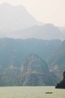 Boat in the river with foggy mountains in the background, Xiling Gorge, Yangtze River, Hubei Province, China Fine Art Print